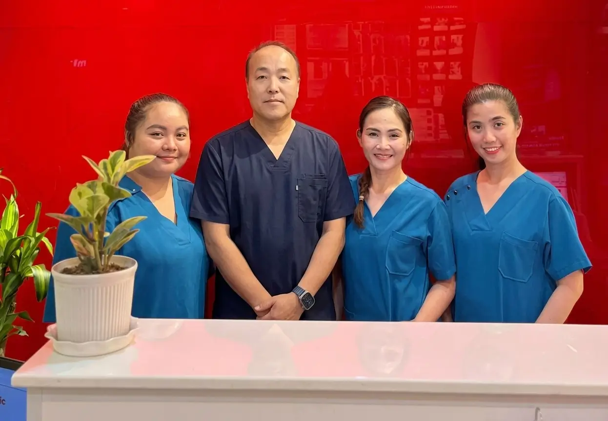 DOC C WITH STAFF.jpg